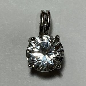 Sterling Silver Pendant with a clear stone.